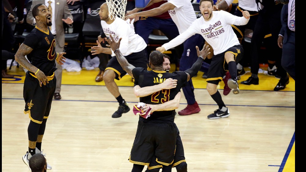 Jun 19, 2016; Oakland, CA, USA; Cleveland Cavaliers forward LeBron James (23) and forward Kevin Love (0) celebrates after beating the Golden State Warriors in game seven of the NBA Finals at Oracle Arena. Mandatory Credit: Kelley L Cox-USA TODAY Sports