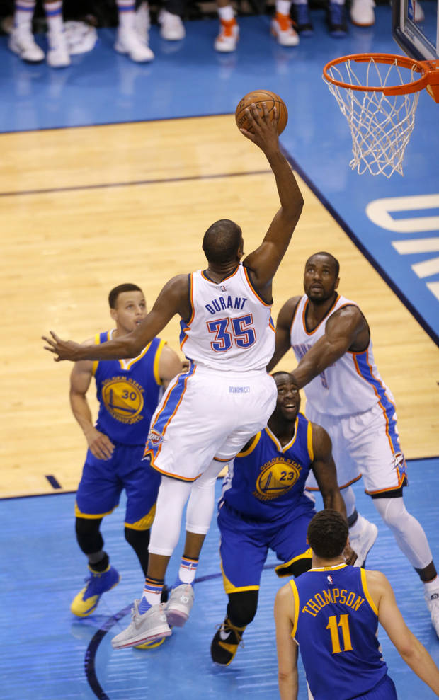Oklahoma City's Kevin Durant (35) goes up for a dunk during Game 3 of the Western Conference finals in the NBA playoffs between the Oklahoma City Thunder and the Golden State Warriors at Chesapeake Energy Arena in Oklahoma City, Sunday, May 22, 2016. Photo by Sarah Phipps, The Oklahoman