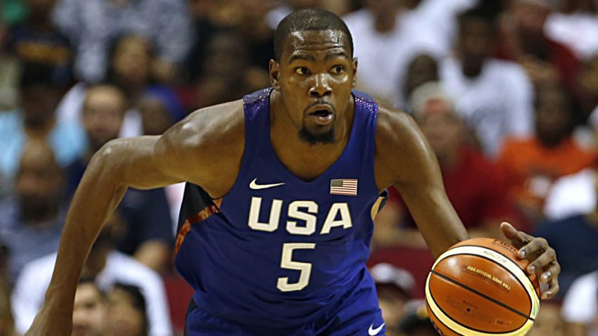 USA's Kevin Durant moves the ball down court during the first quarter of a basketball exhibition game against Nigeria, Monday, Aug. 1, 2016, in Houston. (James Nielsen/Houston Chronicle via AP)