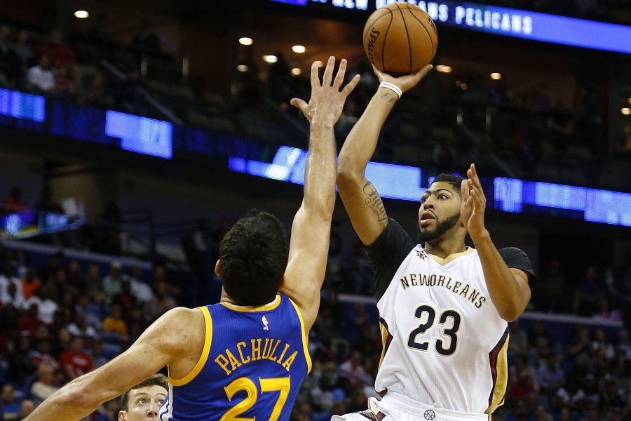 NEW ORLEANS, LA - OCTOBER 28: Anthony Davis #23 of the New Orleans Pelicans shoots over Zaza Pachulia #27 of the Golden State Warriors during the first half of a game at Smoothie King Center on October 28, 2016 in New Orleans, Louisiana. NOTE TO USER: User expressly acknowledges and agrees that, by downloading and or using this photograph, User is consenting to the terms and conditions of the Getty Images License Agreement.  (Photo by Jonathan Bachman/Getty Images)