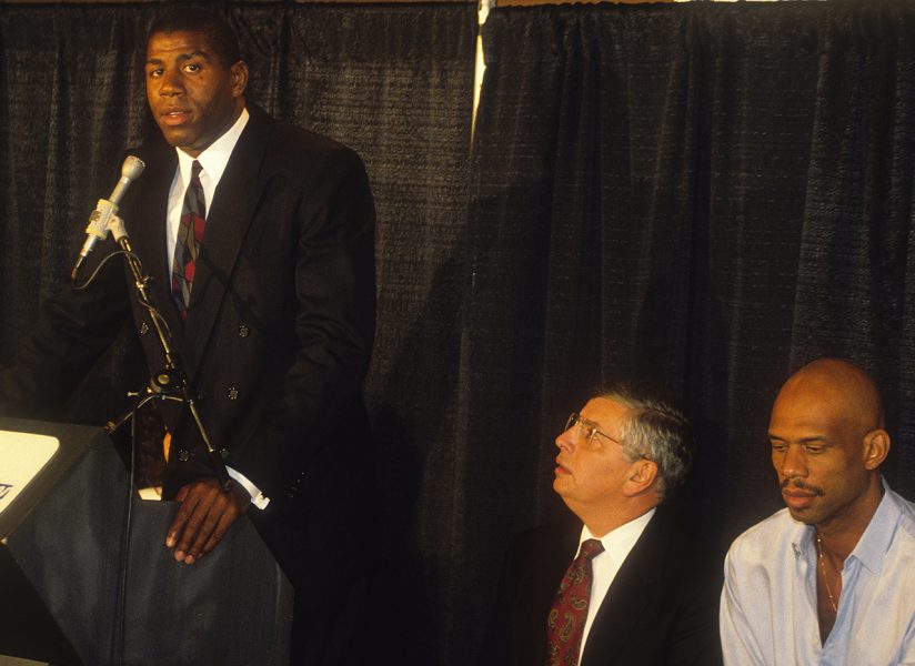 John Harte / The Bakersfield Californian On November 7, 1991, Magic Johnson shocked the world with his announcement that he was HIV positive and, still in the prime of his career, retiring from the Lakers. In this frame is NBA commissioner David Stern, Kareem Abdul-Jabbar and Johnson's agent, Lon Rosen. Californian reporter Brad Turner and photographer John Harte covered the announcement, racing to the Great Western Forum in Inglewood and entering through a kitchen when the main entrance to the press area was inaccessible due to a throng of media and fans who descended to the scene.