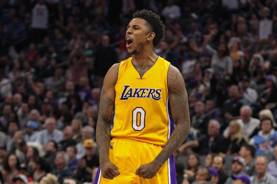 Nov 10, 2016; Sacramento, CA, USA;  Los Angeles Lakers guard Nick Young (0) celebrates after a play against the Sacramento Kings during the second half at Golden 1 Center. The Lakers won the game 101-91. Mandatory Credit: Sergio Estrada-USA TODAY Sports